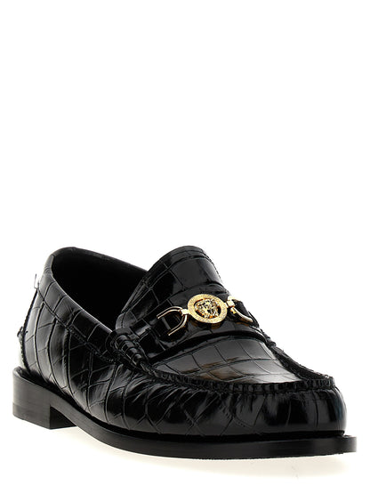 Mocassins à enfiler Versace en cuir noir - Confort et style
