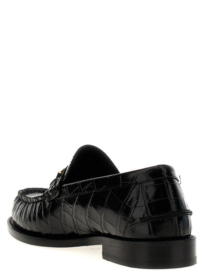 Mocassins à enfiler Versace en cuir noir - Confort et style