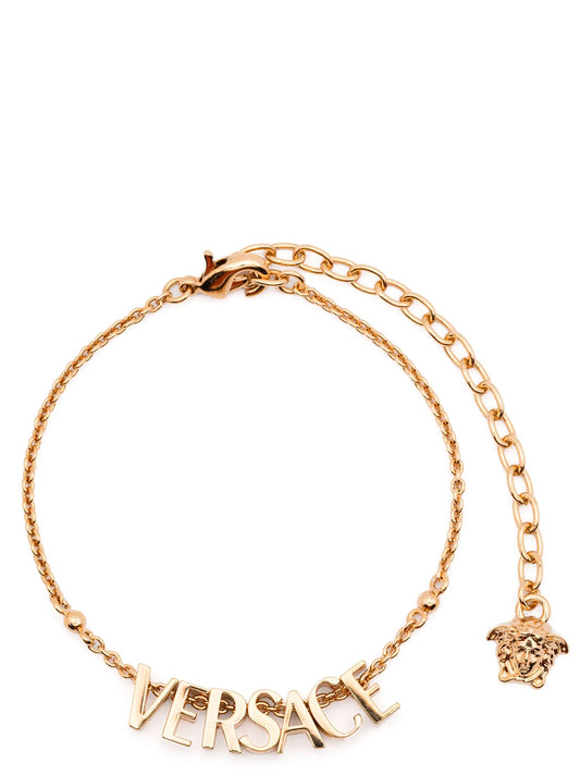 Pulsera metálica dorada de Versace
