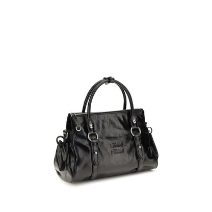 Bolso Miu Miu de piel de becerro negra Bos Taurus