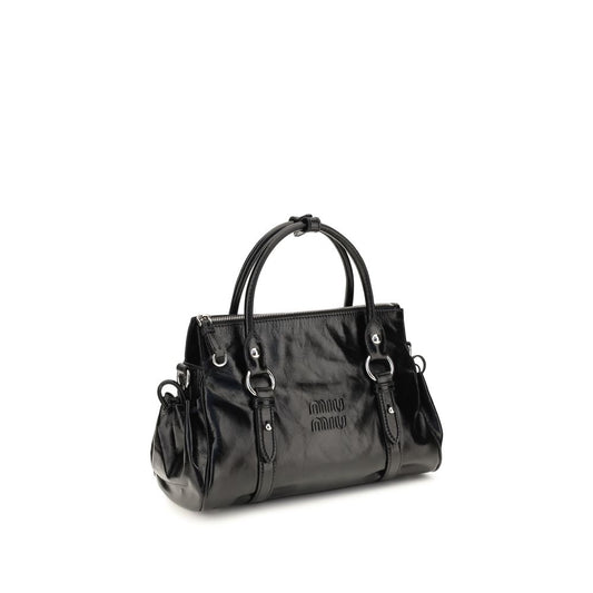 Bolso Miu Miu de piel de becerro negra Bos Taurus
