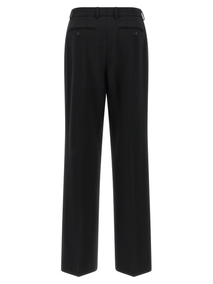 Pantalones casuales Dolce & Gabbana negros de lana virgen