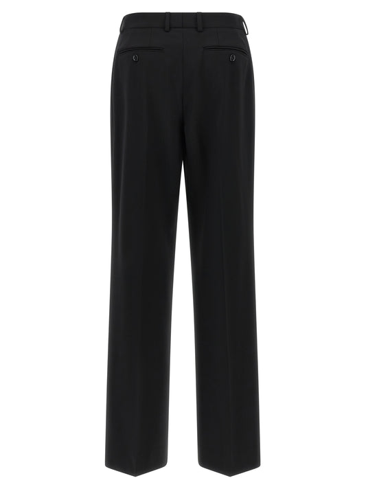 Pantalones casuales Dolce & Gabbana negros de lana virgen