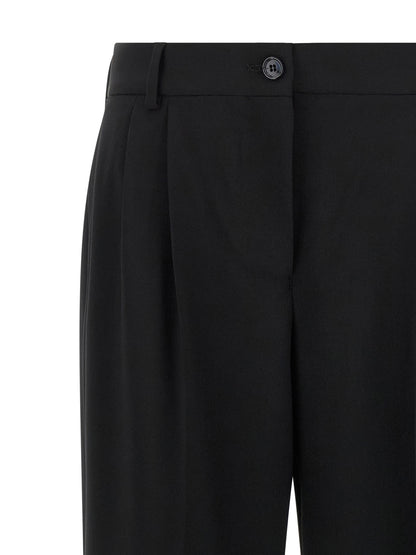 Pantalones casuales Dolce & Gabbana negros de lana virgen