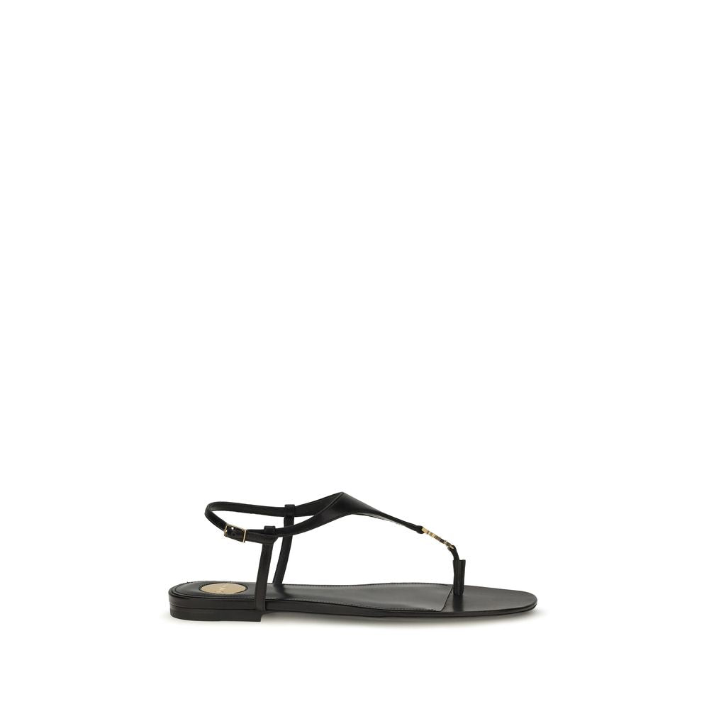 Sandalias planas Saint Laurent de piel de becerro negra Bos Taurus