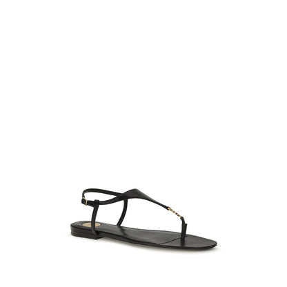 Sandalias planas Saint Laurent de piel de becerro negra Bos Taurus