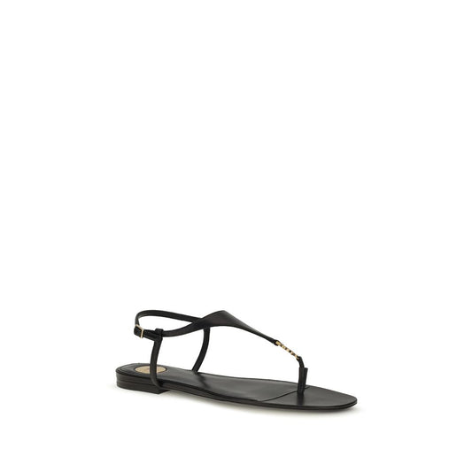 Sandalias planas Saint Laurent de piel de becerro negra Bos Taurus