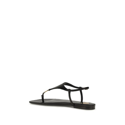 Sandalias planas Saint Laurent de piel de becerro negra Bos Taurus