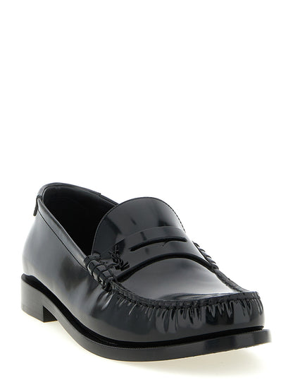 Mocasines sin cordones de piel de becerro negra Saint Laurent
