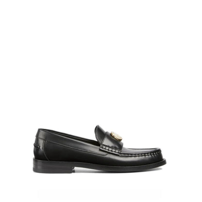 Mocassins à enfiler en cuir noir Gucci