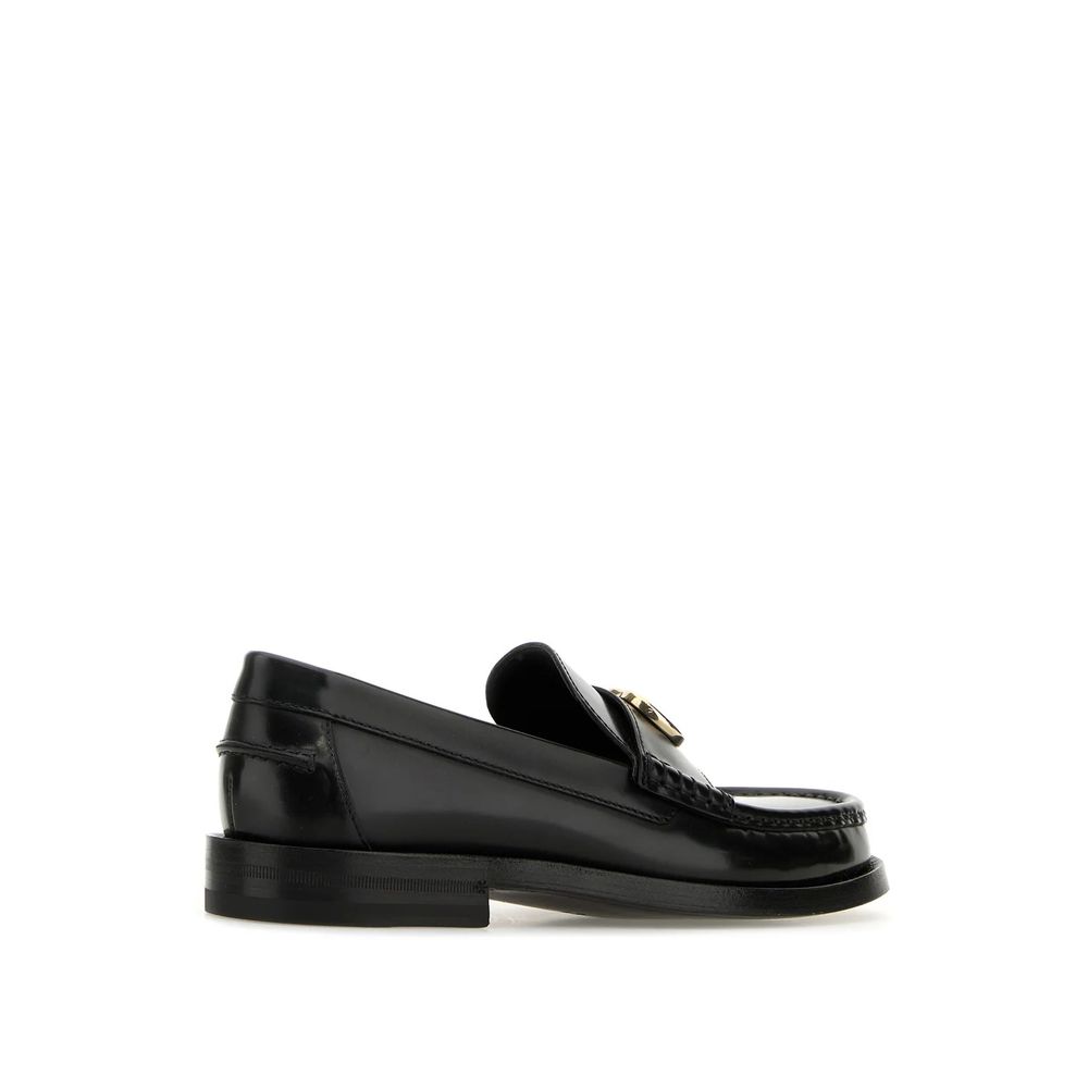 Mocassins à enfiler en cuir noir Gucci