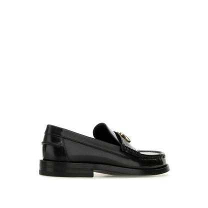 Mocassins à enfiler en cuir noir Gucci