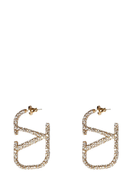 Valentino Garavani - Boucles d'oreilles en laiton doré à la finition brillante