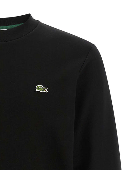 Sweat-shirt Lacoste en coton noir à col rond