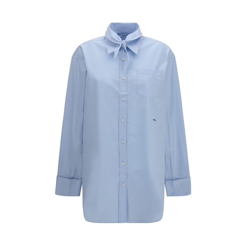 Chemise en coton bleu avec coupe structurée et touche moderne de Prada