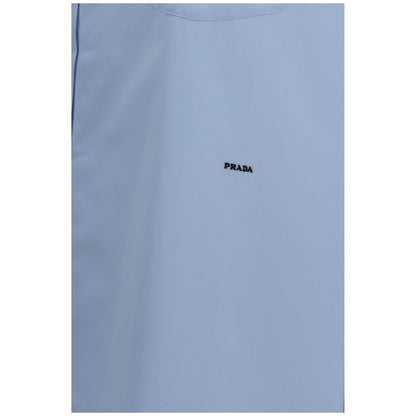 Chemise en coton bleu avec coupe structurée et touche moderne de Prada