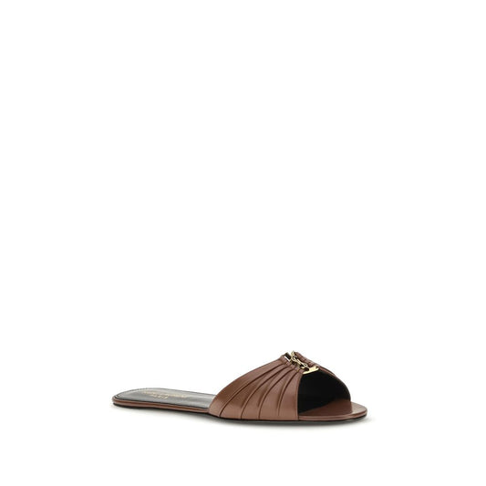 Mules Saint Laurent de piel de becerro marrón Bos Taurus
