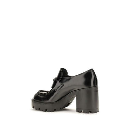 Mocasines de plataforma Prada en piel de becerro negra Bos Taurus