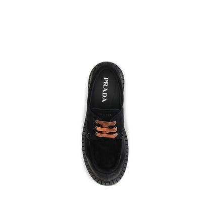 Mocasines Slip On De Gamuza Negra De La Colección Prada