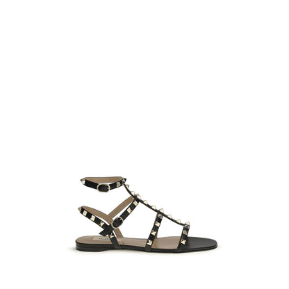 Sandales plates Valentino Garavani en cuir noir Bos Taurus