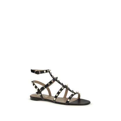 Sandales plates Valentino Garavani en cuir noir Bos Taurus