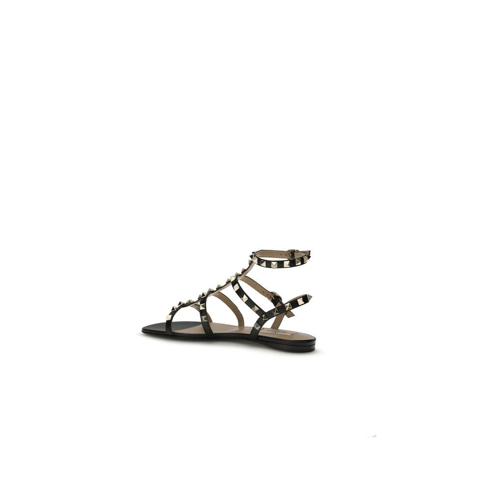 Sandales plates Valentino Garavani en cuir noir Bos Taurus