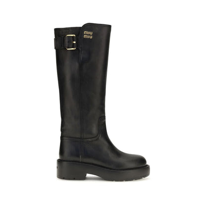 Bottes plates Miu Miu en cuir de veau noir
