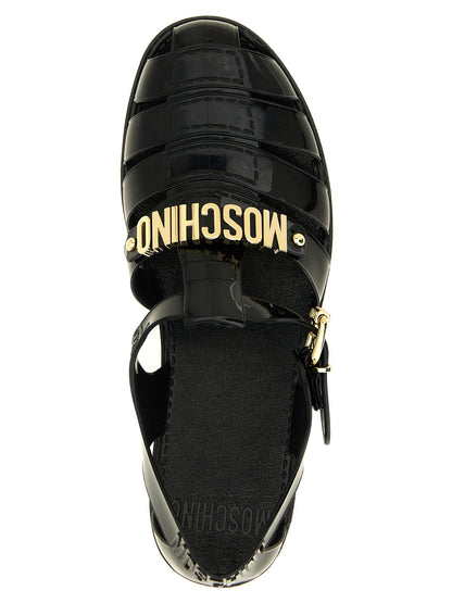 Sandalias Planas De PVC Negro Moschino Con Bandas Transversales