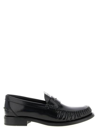 Mocassins à enfiler en cuir noir brossé souple Prada