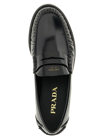 Mocassins à enfiler en cuir noir brossé souple Prada