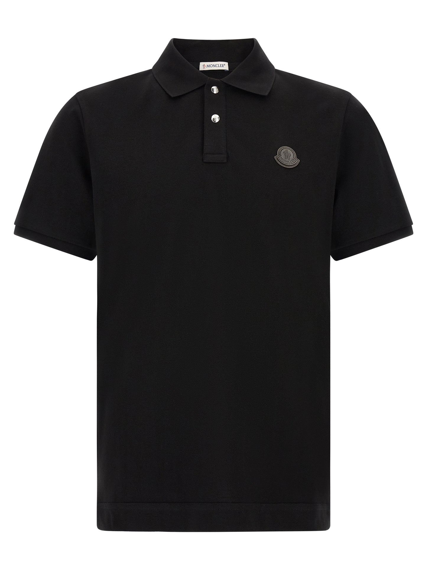 Polo Moncler en fourrure noir, design intemporel et moderne
