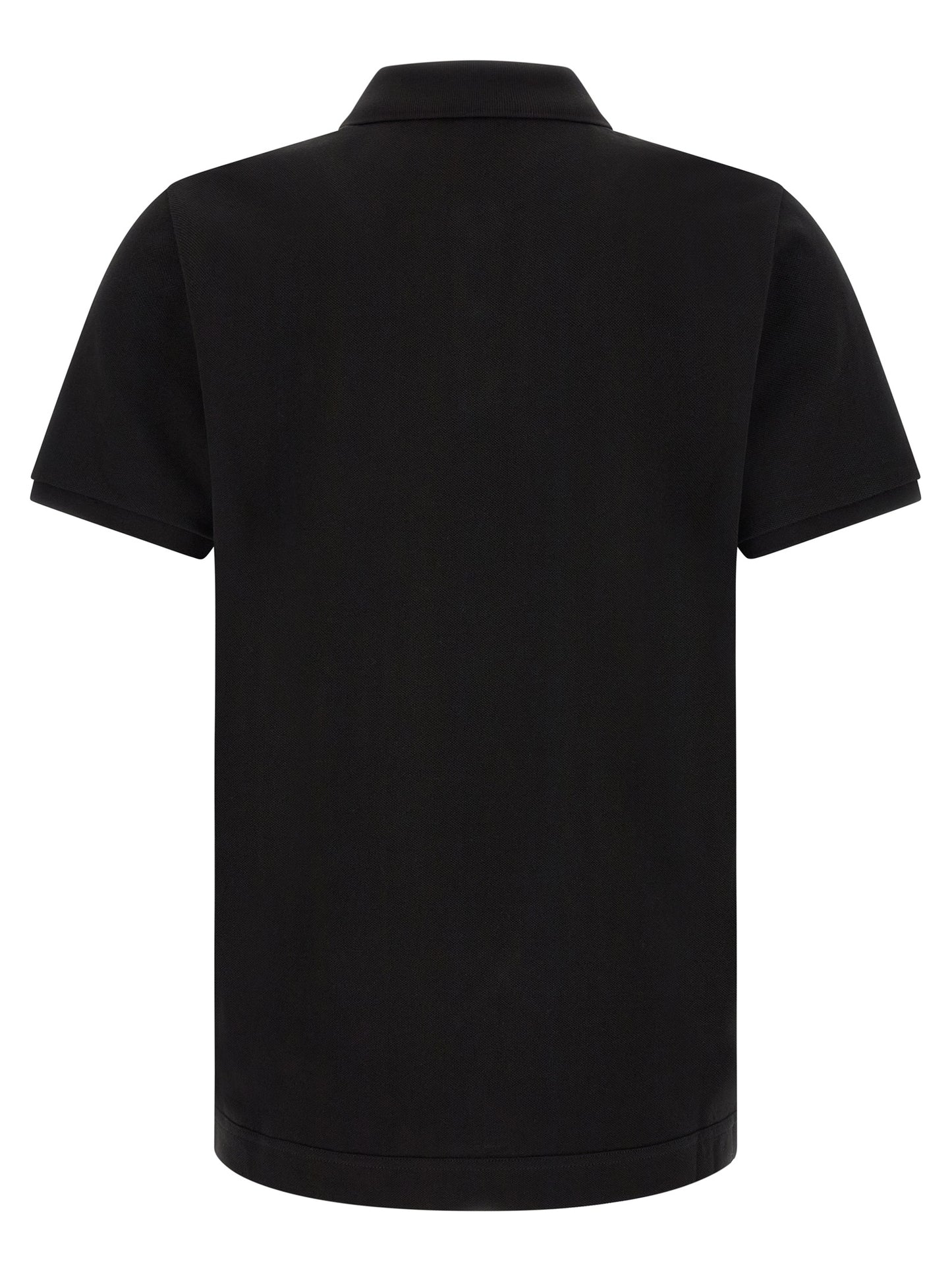 Polo Moncler en fourrure noir, design intemporel et moderne