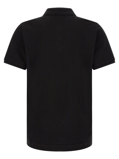 Polo Moncler en fourrure noir, design intemporel et moderne