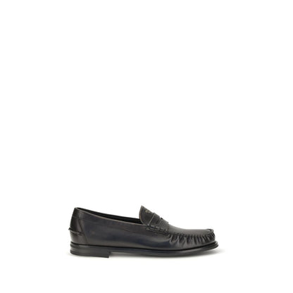 Mocassins Prada en cuir de veau noir Bos Taurus