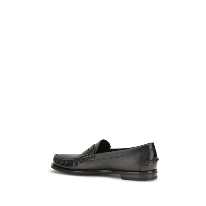 Mocassins Prada en cuir de veau noir Bos Taurus