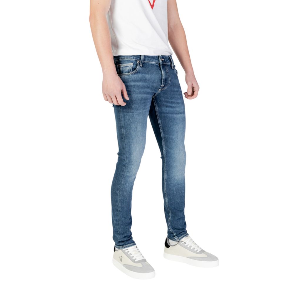 Pantalon skinny en jean de coton bleu Guess