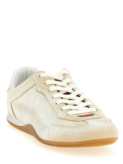 Baskets basses Gucci en cuir de veau beige