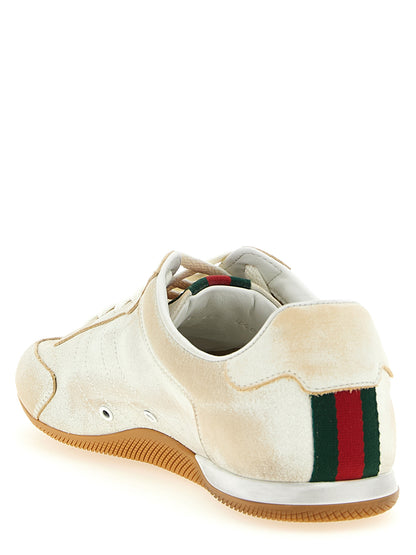 Baskets basses Gucci en cuir de veau beige