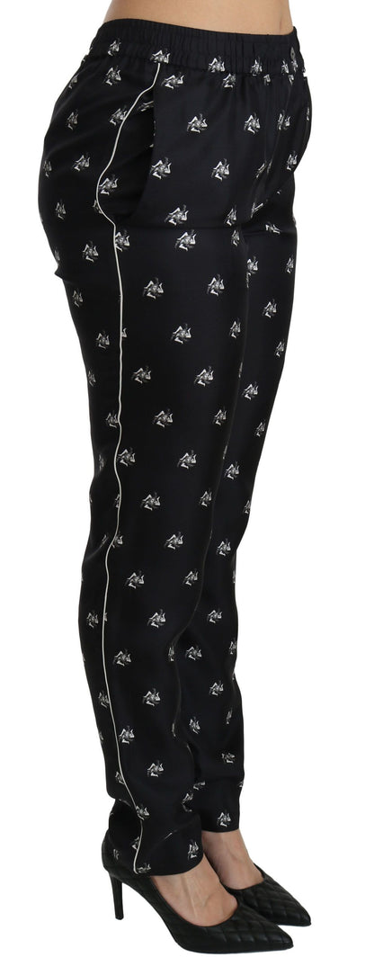 Pantalones pitillo de seda de talle medio con estampado negro de Dolce & Gabbana