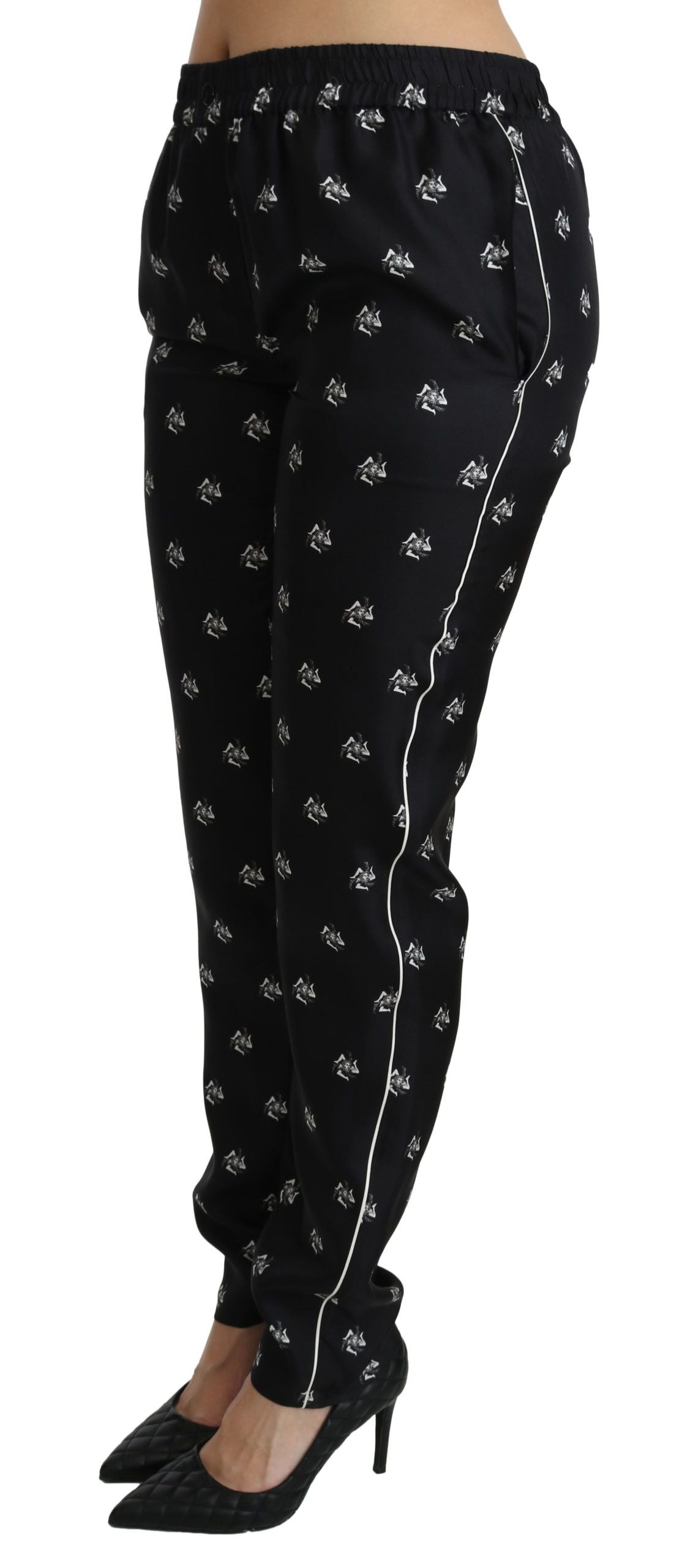 Pantalones pitillo de seda de talle medio con estampado negro de Dolce & Gabbana