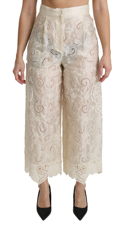 Pantalones palazzo cropped de tiro alto de encaje crema de Dolce & Gabbana
