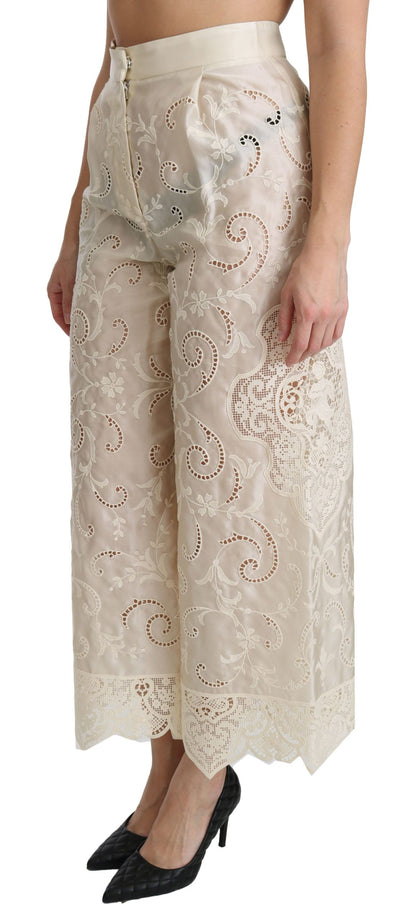 Pantalones palazzo cropped de tiro alto de encaje crema de Dolce & Gabbana