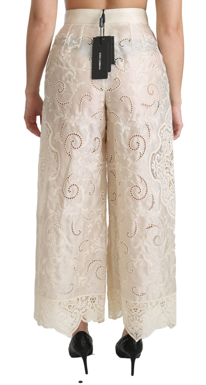 Pantalones palazzo cropped de tiro alto de encaje crema de Dolce & Gabbana