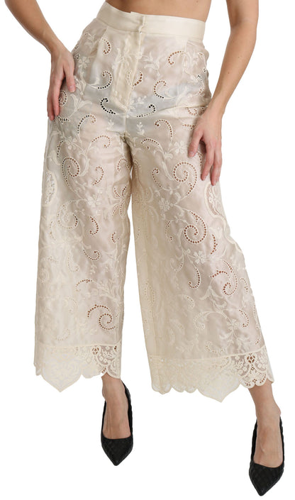 Pantalones palazzo cropped de tiro alto de encaje crema de Dolce & Gabbana