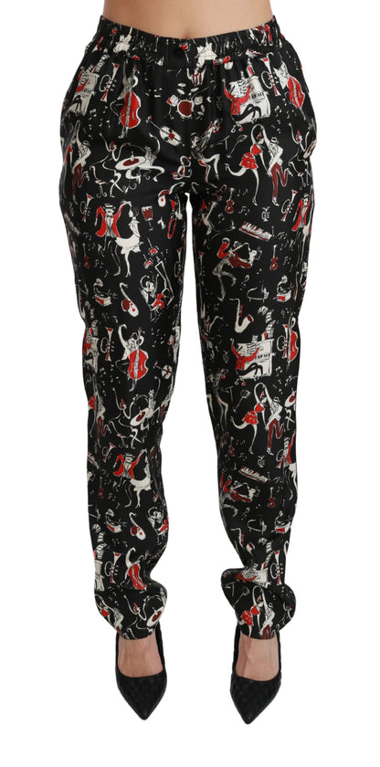 Pantalones de seda negros de talle medio con diseño de instrumentos de Dolce & Gabbana