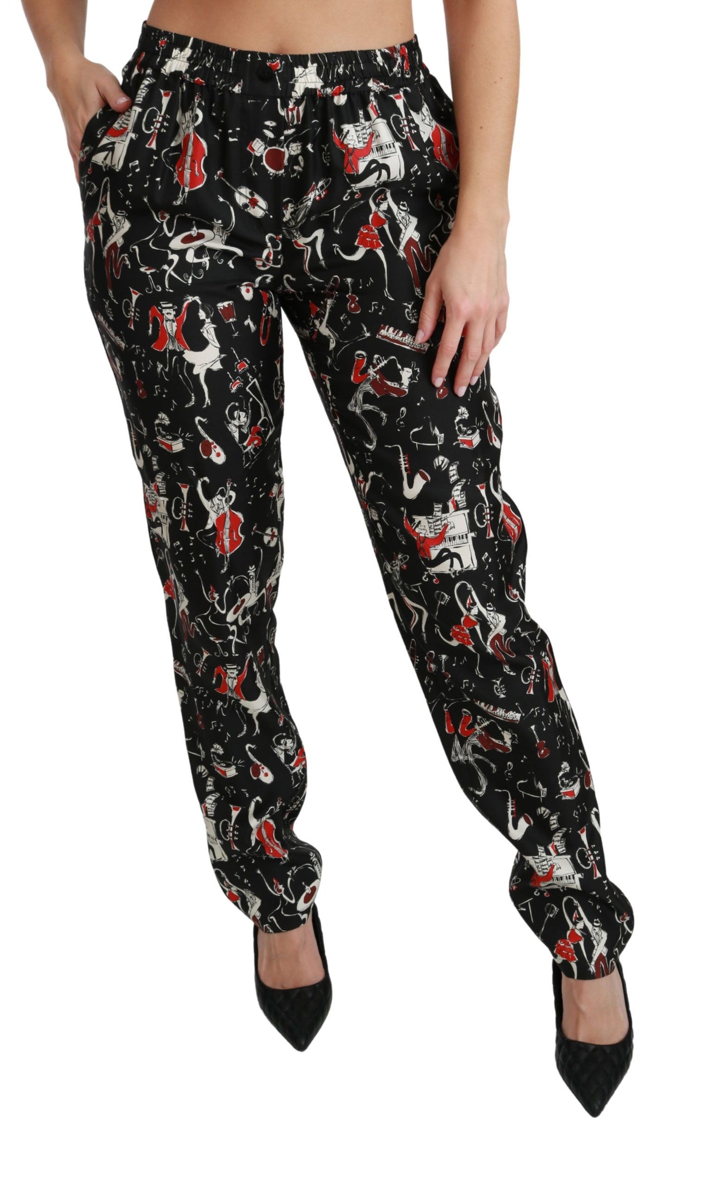 Pantalones de seda negros de talle medio con diseño de instrumentos de Dolce & Gabbana