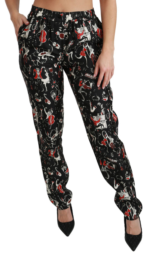 Pantalones de seda negros de talle medio con diseño de instrumentos de Dolce & Gabbana