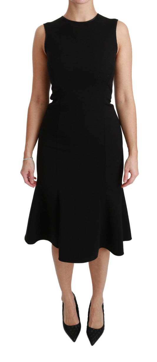 Vestido de tubo de lana elástica con vuelo y corte entallado en negro de Dolce & Gabbana