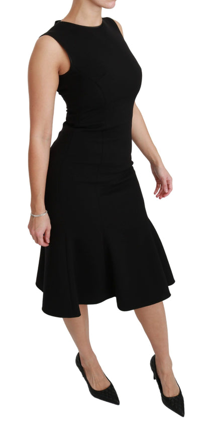 Vestido de tubo de lana elástica con vuelo y corte entallado en negro de Dolce & Gabbana