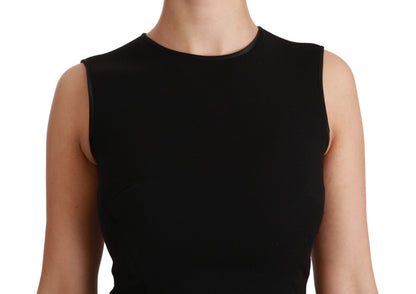 Vestido de tubo de lana elástica con vuelo y corte entallado en negro de Dolce & Gabbana